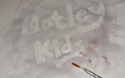 Motley kids in wax resist writing